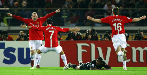 YOKOHAMA, JAPAN - DECEMBER 21: Wayne Rooney of Manchester United celebrates scoring their first goal with Cristiano Ronaldo during the FIFA Club World Cup Japan 2008 final match between Manchester United and Liga de Quito. (Photo by Junko Kimura/Getty Images)