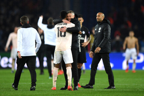 Solskjær og Rashford feirer seier over PSG i Champions League 2019.