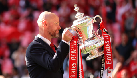 LONDON, ENGLAND - MAY 25: Erik ten Hag, Manager of Manchester United celebrates with the trophy during the Emirates FA Cup Final match between Manchester City and Manchester United at Wembley Stadium on May 25, 2024 in London, England. (Photo by Alex Pantling/Getty Images )