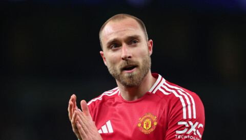 LONDON, ENGLAND - DECEMBER 19: Christian Eriksen of Manchester United applauds during the Carabao Cup Quarter Final match between Tottenham Hotspur and Manchester United at Tottenham Hotspur Stadium on December 19, 2024 in London, England. (Photo by Marc Atkins/Getty Images)