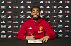 En smilende Matheus Cunha signerer for United, 12. juni 2025.