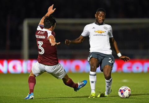 FALT AV: Timothy Fosu-Mensah startet oppgjøret mot Northampton bra, men var hadde visse problemer i forsvar. GettyImages-609556612