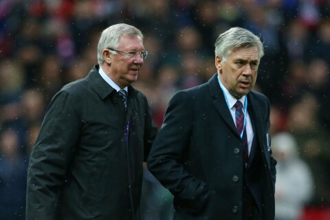 MANCHESTER, ENGLAND - NOVEMBER 14: (L-R) Sir Alex Ferguson the manager of Great Britain and Ireland and Carlo Ancelotti the manager of the Rest of the World take their seats during the David Beckham Match for Children in aid of UNICEF between Great Britain & Ireland and Rest of the World at Old Trafford on November 14, 2015 in Manchester, England. (Photo by Alex Livesey/Getty Images)