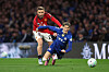 Luke Shaw i duell med Garnacho.