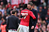 Kobbie Mainoo og Michael Carrick