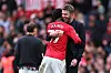 Kobbie Mainoo og Michael Carrick