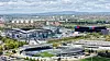 Etihad Stadium og Joie Stadium (Academy Stadium), aerial view, 19. april 2026.