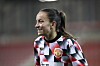 En smilende Lucy Staniforth under oppvarming, 7. desember 2022.