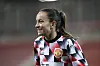 En smilende Lucy Staniforth under oppvarming, 7. desember 2022.