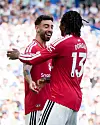 Bruno Fernandes og Patrick Dorgu feirer Dorgus 1-0-mål borte mot Brighton, 24. mai 2026.