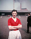 Fargelagt bilde av Johnny Berry, datert 1. april 1957 på Getty Images.