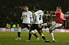 DERBY, ENGLAND - JANUARY 29: Wayne Rooney of Manchester United scores their first goal during the Emirates FA Cup Fourth Round match between Derby County and Manchester United at Pride Park Stadium on January 29, 2016 in Derby, England. (Photo by John Peters/Man Utd via Getty Images)