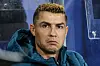 Cristiano Ronaldo som ser småsur ut på benken for Portugal, 27. september 2026.