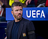 Michael Carrick med teksten UEFA ved siden av seg, 13. oktober 2026.