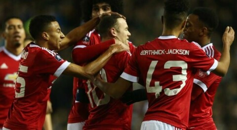 DERBY, ENGLAND - JANUARY 29: Wayne Rooney of Manchester United (10) celebrates with team mates as he scores ther first goal during the Emirates FA Cup fourth round match between Derby County and Manchester United at iPro Stadium on January 29, 2016 in Derby, England. (Photo by Matthew Lewis/Getty Images)