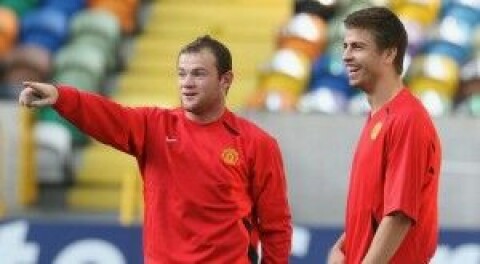 Wayne Rooney og Gerard Pique
