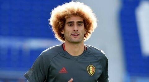 Marouane Fellaini under fjorårets EM med Belgia. Her med blondfarget hår.