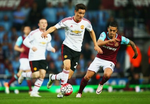 Ander Herrera of Manchester United is chased by Manuel Lanzini of West Ham United during the Barclays Premier League match between West Ham United and Manchester United at the Boleyn Ground on May 10, 2016 in London, England.