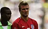 David Beckham of England is marked by Femi Opabunmi of Nigeria