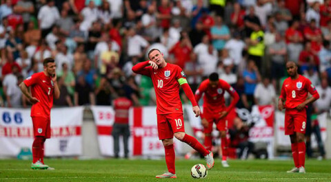 LJUBLJANA, SLOVENIA - JUNE 14: Captain Wayne Rooney of England prepares to restart after conceding the first goal during the UEFA EURO 2016 Qualifier between Slovenia and England on at the Stozice Arena on June 14, 2015 in Ljubljana, Slovenia. (Photo by Stu Forster/Getty Images)