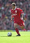 Michael Owen of Liverpool rus with the ball