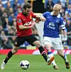 JUAN MATA: Her i duell med Evertons Steven Naismith.