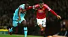 MANCHESTER, ENGLAND - DECEMBER 05: Jesse Lingard of Manchester United and Michail Antonio of West Ham United compete for the ball during the Barclays Premier League match between Manchester United and West Ham United at Old Trafford on December 5, 2015 in Manchester, England. (Photo by Clive Brunskill/Getty Images)