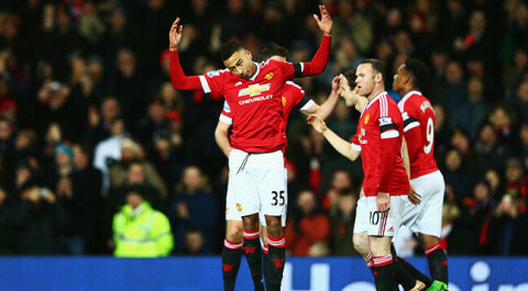 MANCHESTER, ENGLAND - FEBRUARY 02: Jesse Lingard (L) of Manchester United celebrates scoring his team's first goal with his team mates during the Barclays Premier League match between Manchester United and Stoke City at Old Trafford on February 2, 2016 in Manchester, England. (Photo by Clive Mason/Getty Images)